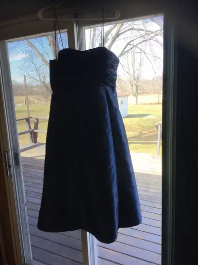 This beauty is a 3/4 length size 12 blue satin which may be worn with Spaghetti straps or strapless....