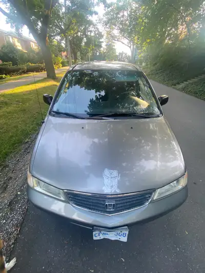 Take a look at this 2000 Honda Odyssey, a reliable minivan ready for new adventures. It has a smooth...