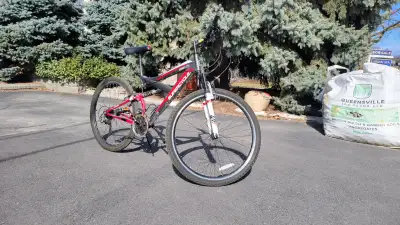 This a Supercycle mountian bike with rear suspenison. Tires are worn down and any new tubes you put...