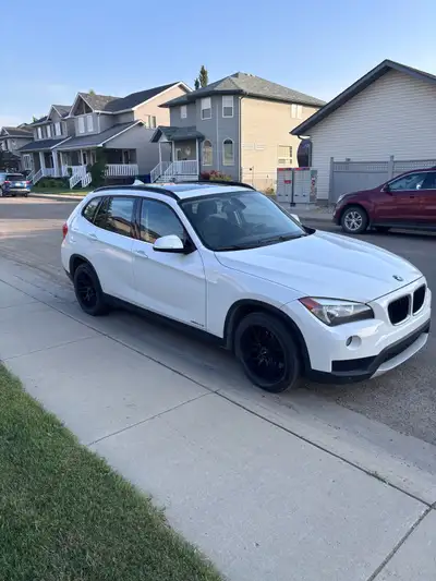 2013 BMW X1 28i ~208,000 km 2.0 L engine, 8spd auto Very clean inside and out. Runs and drives well....