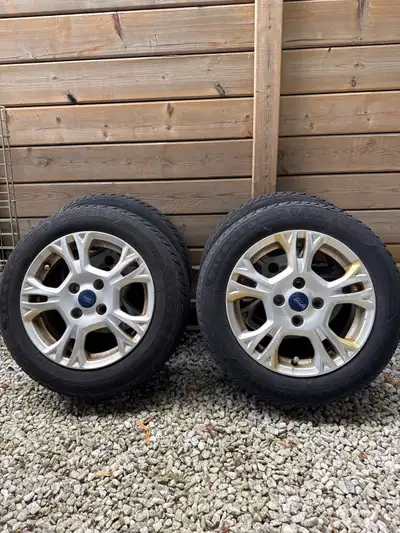 Selling a set of Ford Fiesta 15 inch factory ford rims with tires, These are in good used condition...