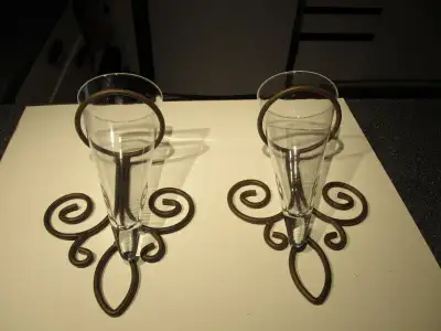 Cast iron and glass cone vases set., View more