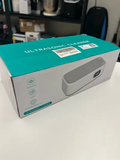 Keep your valuables sparkling with this ultrasonic cleaner. New in box. This device uses ultrasonic...