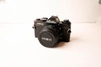 Minolta XD11 35mm film camera with lens