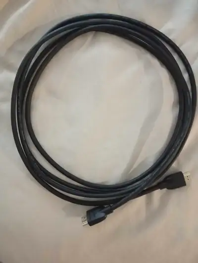 Amazon Basics HDMI cable and a computer power cable, View more