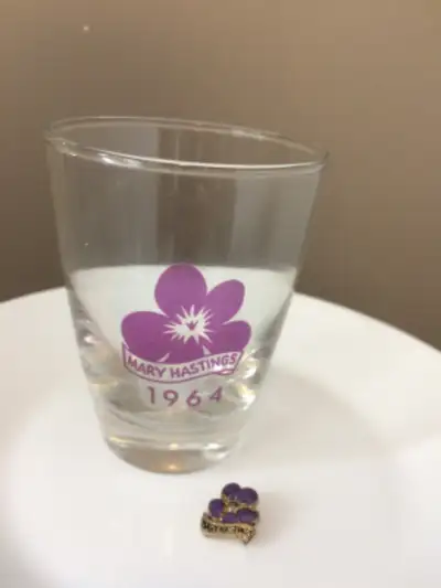 Memorabilia from the newspaper columnist Mary Hastings from 1964. Small drinking glass is approximat...