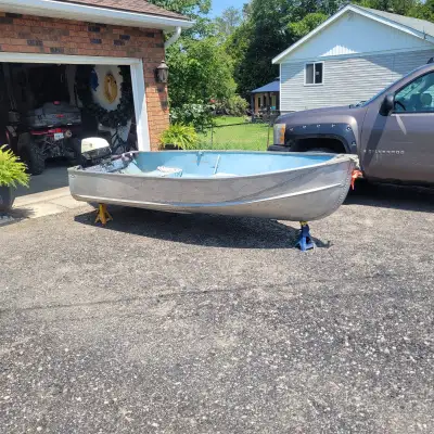 12 ft aluminum boat with 6hp johnson for1500 in excellent condition