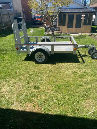 2019 Sterling utility trailer. 5 x 7 feet. (Trailer dolly and chihuahua in the pictures are NOT incl...