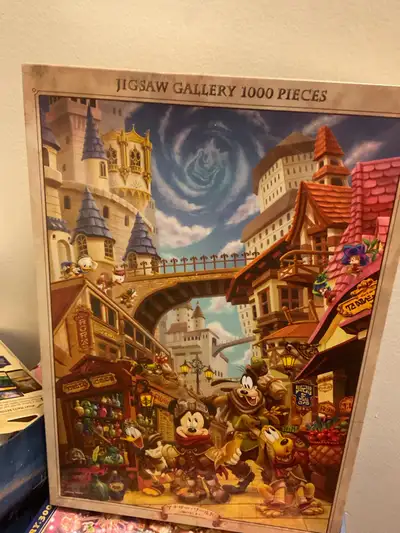 Various puzzles. Most are new. All adult owned. If opened they were put together once and put back i...
