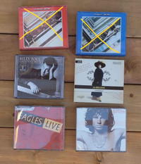 CD coffret La Bolduc, the Doors, Beatles...