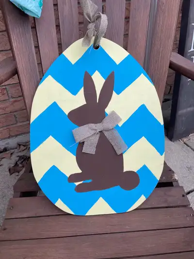 wooden plaque with rabbit inside an egg, View more