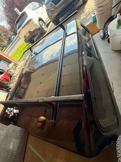Leer truck topper/cap/canopy with 2 locks and key, windows open on both sides and have screening. 6...