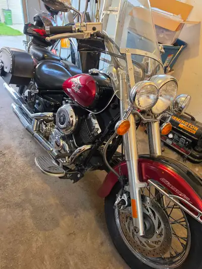 Selling my 650 V-Star Classic with 31415kms. Alberta registered. $2000. Firm as there is two new tir...