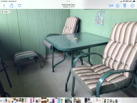 Outside table and 4 cushioned chairs