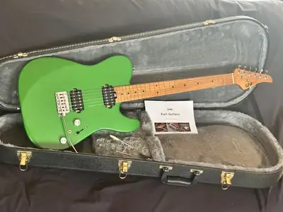 Mint condition Eart TL-380 in a Pearl Green finish This guitar is in a like new condition and has ve...