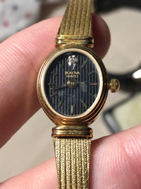 Gold Bulova Watch