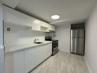 FULLY RENOVATED & FRESHLY PAINTEDSemi-Basement apartment!