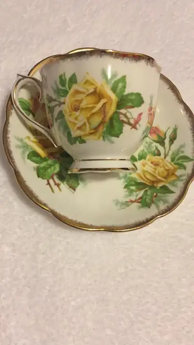 Royal Albert bone China teacup and saucer, View more