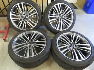 4 factory alloy wheels in great shape with Pirelli tires plus chrome wheel nuts.
