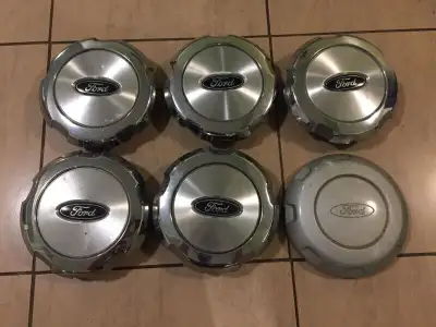 I have a total of 9 (nine) center caps for Ford F-150 trucks. As displayed in the ad's main heading:...