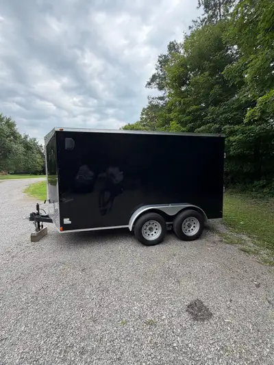 2023 6 x 12 enclosed trailer brakes on both axles rear ramp door side door excellent condition no Wi...