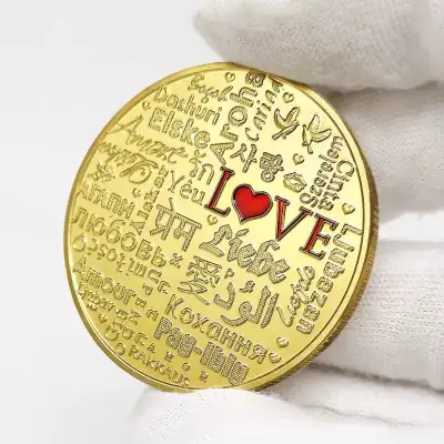 LOVE coin for sale. Asking $10 each. Brand new, gold plated with protective case. The coin measures...
