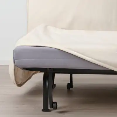 IKEA folding bed/cot can be used as a guest bed or as a chair Twin size (one person sleeps). IKEA mo...