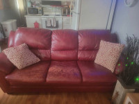 Red genuine leather sofa & matching chair. 
