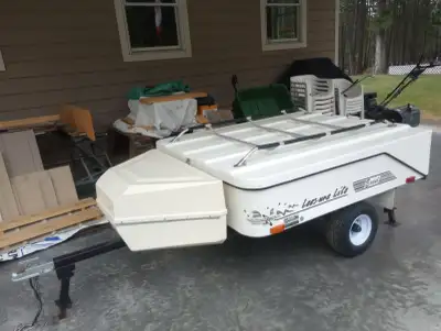2001 Excel Lees-ure Lite pop up tent trailer for small car or motorcycle. Trailer size 54x66. Double...