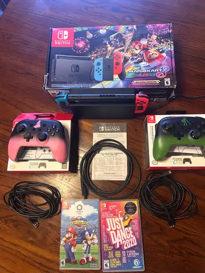 Nintendo Switch + Mario Kart 8 Deluxe, View more
