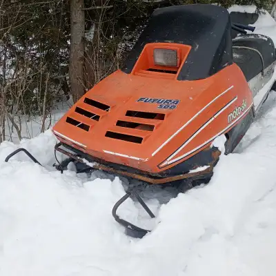 Bombardier Futura 500 as is. No spark. Won't start. Solid, no rips in seat. Best offer.