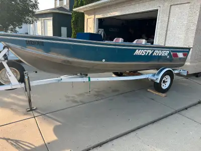 17 ft misty river aluminum boat. Great condition no dents and no leaks. Has 2 live wells floor is go...