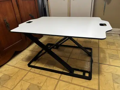 Upper Beaches near Woodbine station. Adjustable low-height folding laptop table in very good conditi...