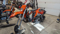 Pair of low hour snowbike for sale 