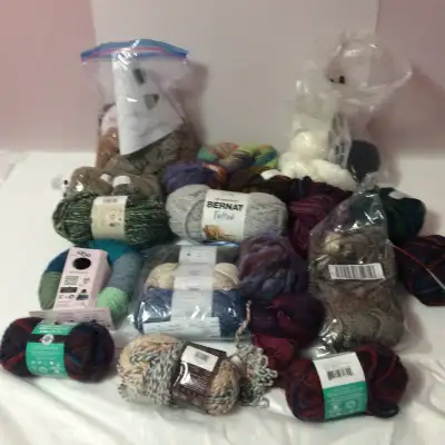 Very cheap , all for 45 dollars. Collection of various yarns, including several skeins of Bernat Fel...