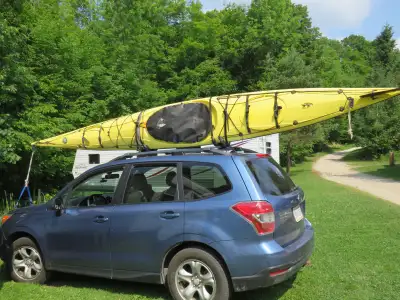 17'6" fiberglass sea Kayak . Yakama rudder , hatch cover , skirt . light scratches from normal usage...
