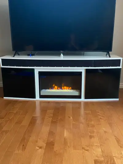 $800 ~~ Brand New Tv Unit with built in soundbar and Fire, View more