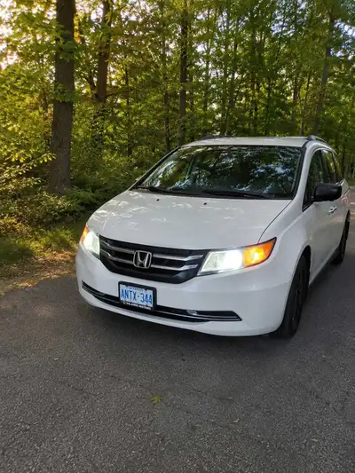 This 2014 Honda Odyssey SE is a reliable and spacious minivan, currently in used condition, offering...