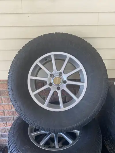 Rims have factory coating that prevents corrosion & pitting. All four are like new. Rim size B.P..5x...