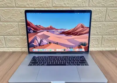 MacBook pro 15 Retina Touch Bar/ ID 2017 in excellent condition. Come with power adapter. -Intel Cor...