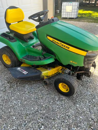 John Deere X310 Power steering and deck lift, View more