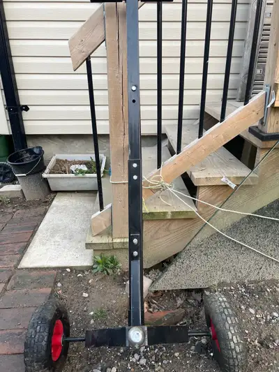 This tow dolly is ideal for moving trailers and other equipment around your property. It's in used c...