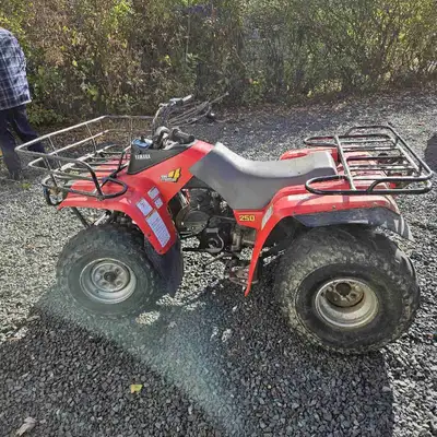 2nd owner 1990 yamaha moto 4 250 with ownership in my name starts idles and drive great, even stops...