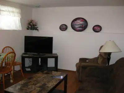 SE furnished room in quiet home for nonsmoking, working male. Full kitchen, laundry, microwave, dish...