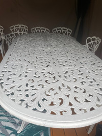 Cast iron,  table and seven chair