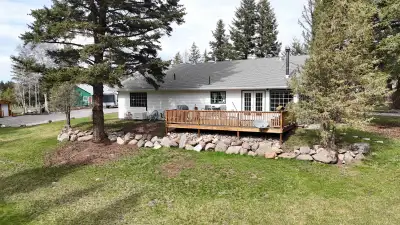 This beautiful 1,800 sqft, 3-bedroom, 2-bath rancher features an open-concept design, a cozy wood fi...
