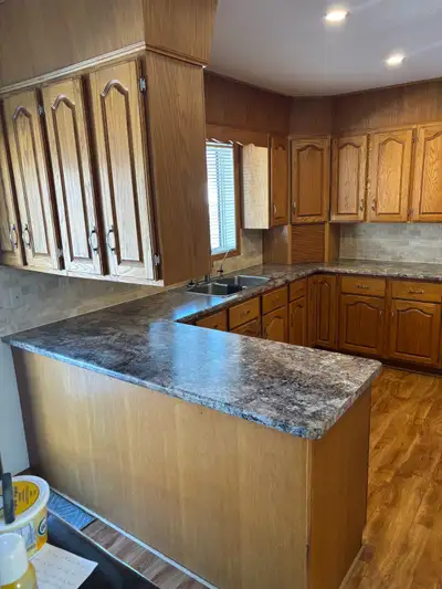 FOR SALE Oak kitchen, washrooms, laundry cabinets (measurements for kitchen in photos). $4300.00 obo...
