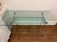 Modern glass table with metal frame