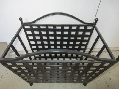 1.Black metallic magazine basket / plant pots rack for $25 very good condition 2. Black metallic mag...