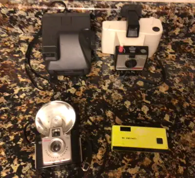 LOT OF VINTAGE CAMERAS, View more
